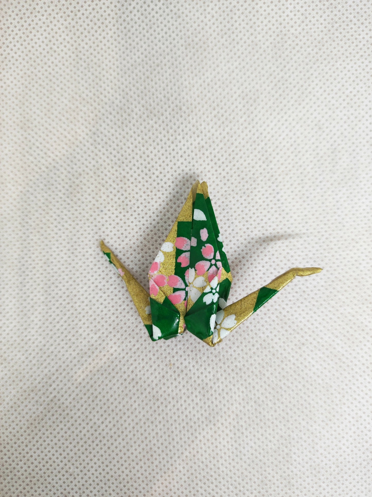 Broche grue origami verte